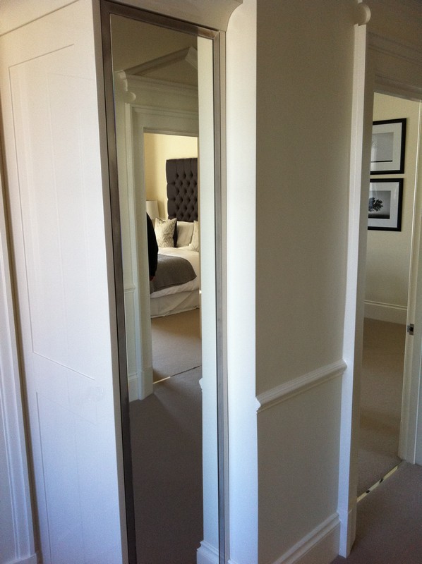Full-length wardrobe mirror fitted in Holland Park home